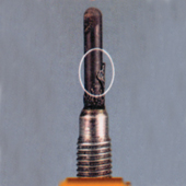 Defective glow plug with holes, cracks or melting next to the body of the plug